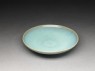 Shallow dish with blue glaze (oblique)