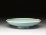 Shallow dish with blue glaze (oblique)