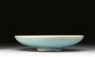 Shallow dish with blue glaze (side)