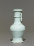 White ware vase with 'S'-shaped handles (side)