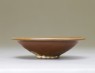 Ding type bowl with russet iron glaze (side)