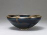 Black ware bowl with brown stripes (oblique)
