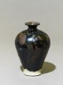 Black ware vase with 'partridge feather' glazes (oblique)