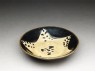 Black ware bowl with star (oblique)