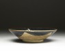 Black ware bowl with star (oblique)