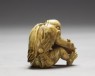 Netsuke in the form of a man making a mat (side)