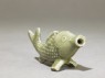 Greenware water-dropper in the form of a fish (oblique)