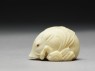 Netsuke in the form of a wild boar among grass (side)