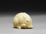 Netsuke in the form of a wild boar among grass (side)