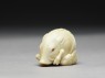 Netsuke in the form of a wild boar among grass (side)