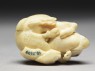 Netsuke in the form of a wild boar among grass (bottom)