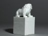 Porcelain seal surmounted by shishi, or lion dog, and pup (side)