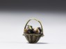 Ojime in the form of a fruit basket (side)