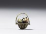 Ojime in the form of a fruit basket (side)