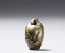 Ojime in the form of a hatching bird (side)