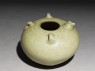 Greenware jar with chicken head and tail (oblique)