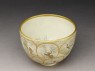 Satsuma tea bowl with animals, plants, and figures (oblique)