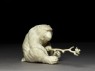 Okimono, or ornament, in the form of a monkey holding a branch (side)