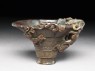 Rhinoceros horn libation cup with bronze-style decoration (oblique)