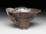 Rhinoceros horn libation cup with bronze-style decoration (oblique)