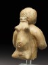 Figure of a musician carrying a water-skin (back)