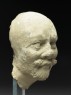 Stucco head of a man (side)