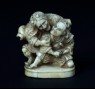 Netsuke in the form of Taira no Koremochi defending himself against a witch (front)