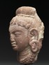 Female head with headdress (side)