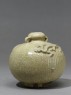 Greenware jar with dragons in relief (side)