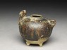 Brown glazed rabbit lime-pot (oblique)