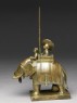 Toy soldier with elephant and driver (side)