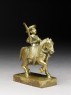 Toy soldier with horse and sabre (side)
