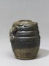 Dark brown glazed dragon jar (oblique)