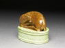 Porcelain seal surmounted by a deer (oblique)