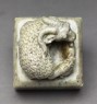 Soapstone seal surmounted by a ram and two lambs (top)