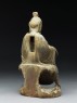 Seated figure of a bodhisattva (side)