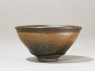 Black ware tea bowl with 'hare's fur' glaze (side)