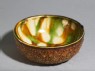 Bowl with floral decoration and three-colour glaze (oblique)