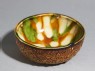 Bowl with floral decoration and three-colour glaze (oblique)