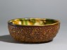 Bowl with floral decoration and three-colour glaze (oblique)