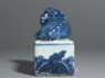 Blue-and-white seal surmounted by a shishi, or lion dog (side)