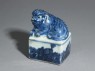 Blue-and-white seal surmounted by a shishi, or lion dog (oblique)