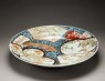 Dish with a shishi, or lion dog, amid animals and flowers (oblique)