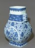 Blue-and-white vase with fruit and leaves (oblique)