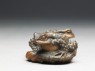 Netsuke in the form of two toads on a sandal (side)