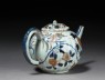 Small fluted teapot with floral decoration (side)