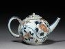 Small fluted teapot with floral decoration (side)