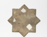 Star tile with vegetal and calligraphic decoration (back)