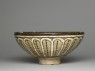 Bowl with flying phoenixes against a foliate background (side)