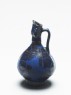 Jug with human-headed spout (oblique)